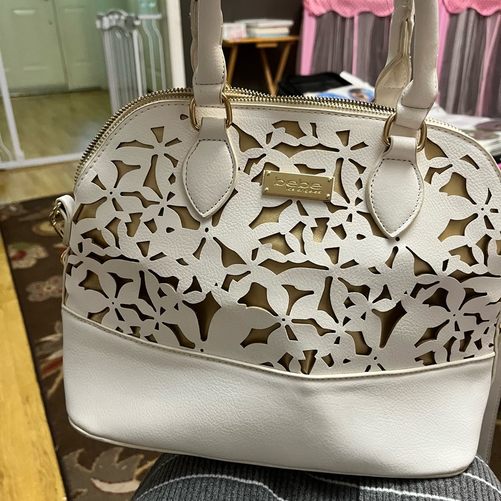 Bebe Los Angeles white and gold floral cutout purse with crossbody strap